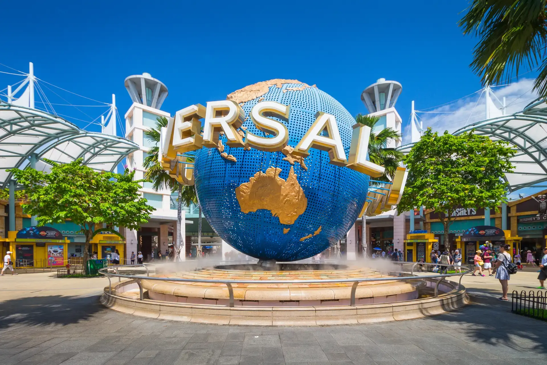 The Universal globe spinning at the park entrance — Universal Studios Singapore in Sentosa Island