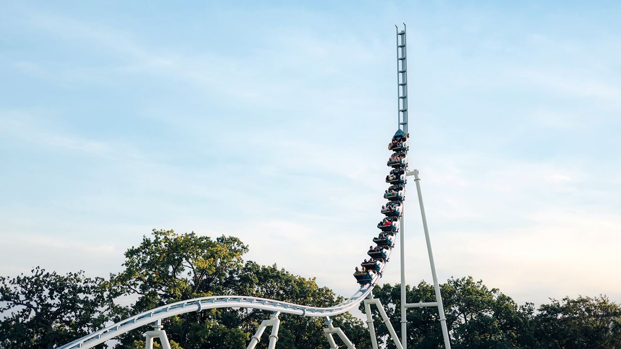 Valkyria plunging into its vertical drop at dusk — Liseberg in Gothenburg
