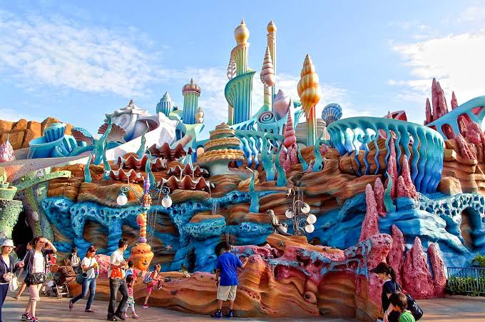 Mermaid Lagoon coral facades under blue sky — Tokyo Disneyland in Urayasu, Chiba