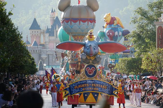 Flights of Fantasy Parade rolling down Main Street, U.S.A. — Hong Kong Disneyland in Lantau Island, Hong Kong