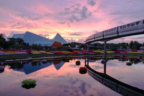 Sunset Reflections of Imagination! Pavilion and the Monorail — EPCOT in Bay Lake, Florida