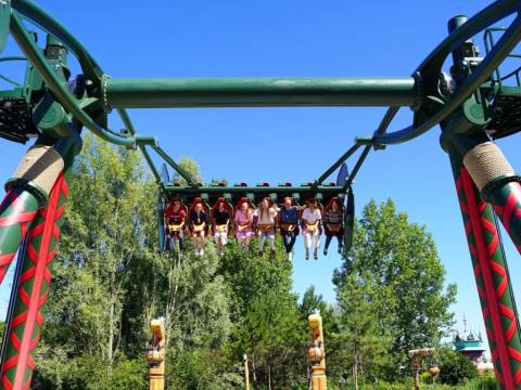 Riders Soaring on a Giant Swing Attraction — Plopsaland De Panne in De Panne