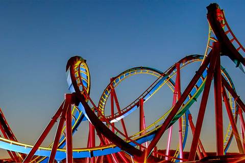 Scream Roller Coaster Illuminated at Dusk — Six Flags Magic Mountain in Valencia, California