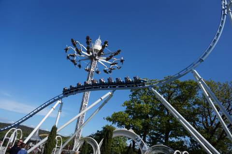 Helix Roller Coaster Passing AeroSpin at Liseberg