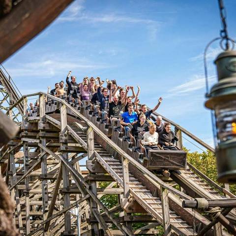 Riders on Colossos Wooden Roller Coaster — Heide Park Resort in Soltau, Lower Saxony