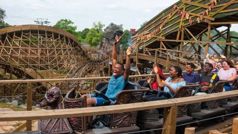 Riders on the Wicker Man Wooden Roller Coaster — Alton Towers in Staffordshire, England