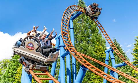 Riders on the Spinball Whizzer Roller Coaster — Alton Towers in Staffordshire, England