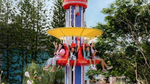 Family Riding Sylvester and Tweety Clocker — Warner Bros. Movie World in Oxenford, Queensland