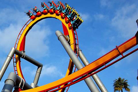 Silver Bullet Inverted Coaster Soaring Overhead — Knott's Berry Farm in Buena Park, California