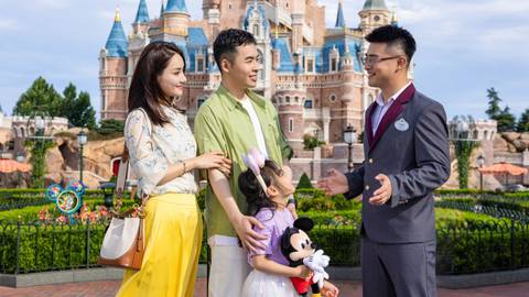 Guests and Guide at Enchanted Storybook Castle — Shanghai Disneyland in Shanghai